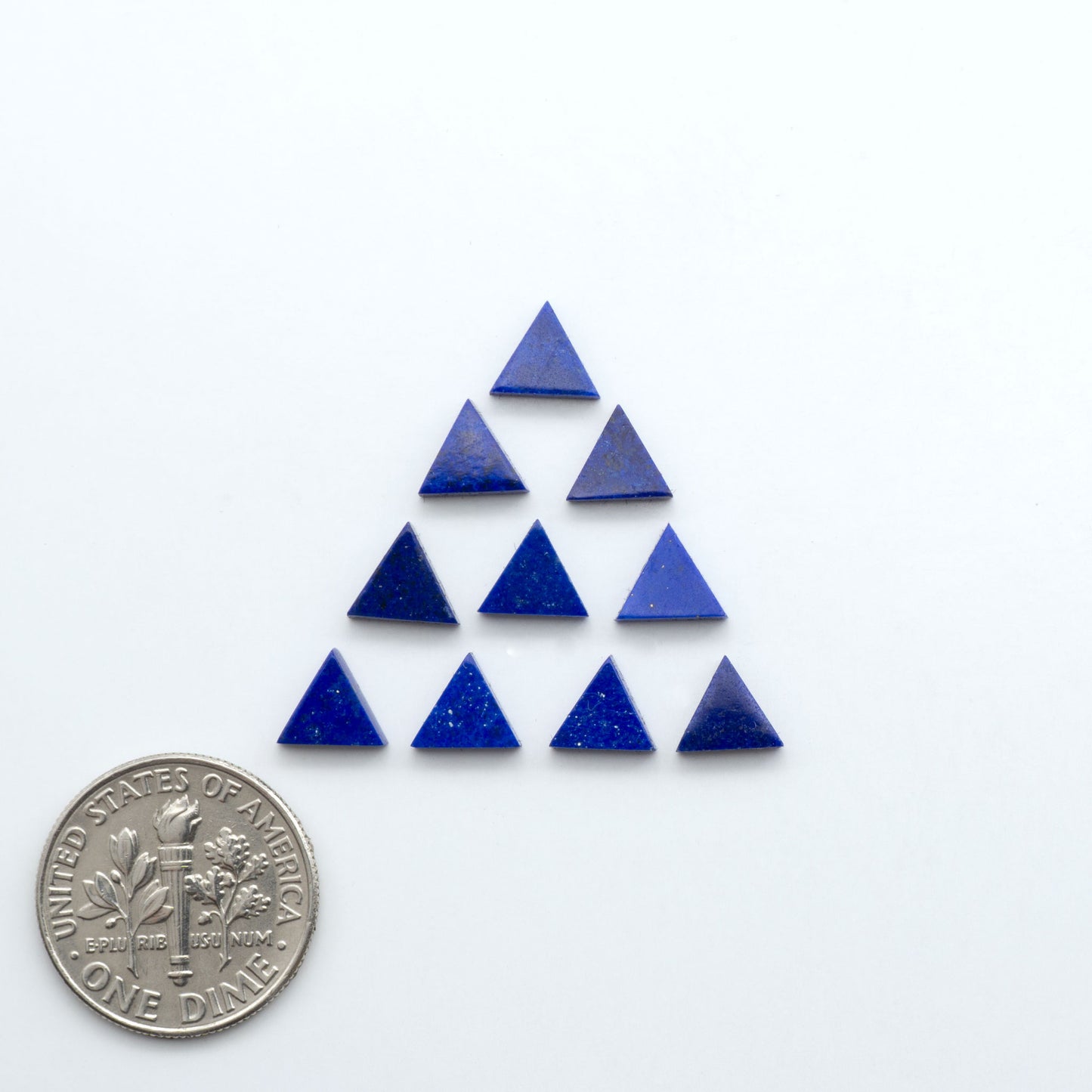 Shop natural Lapis Lazuli cabochons with rich blue tones and golden pyrite, perfect for silversmiths and jewelry makers designing custom pieces.