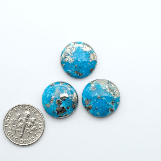 Nacozari turquoise cabochons are striking gemstones known for their vibrant blue to greenish-blue colors and pyrite, these stones are prized in jewelry making.