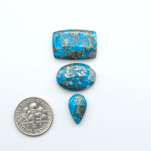 Nacozari turquoise cabochons are striking gemstones known for their vibrant blue to greenish-blue colors and pyrite, these stones are prized in jewelry making.