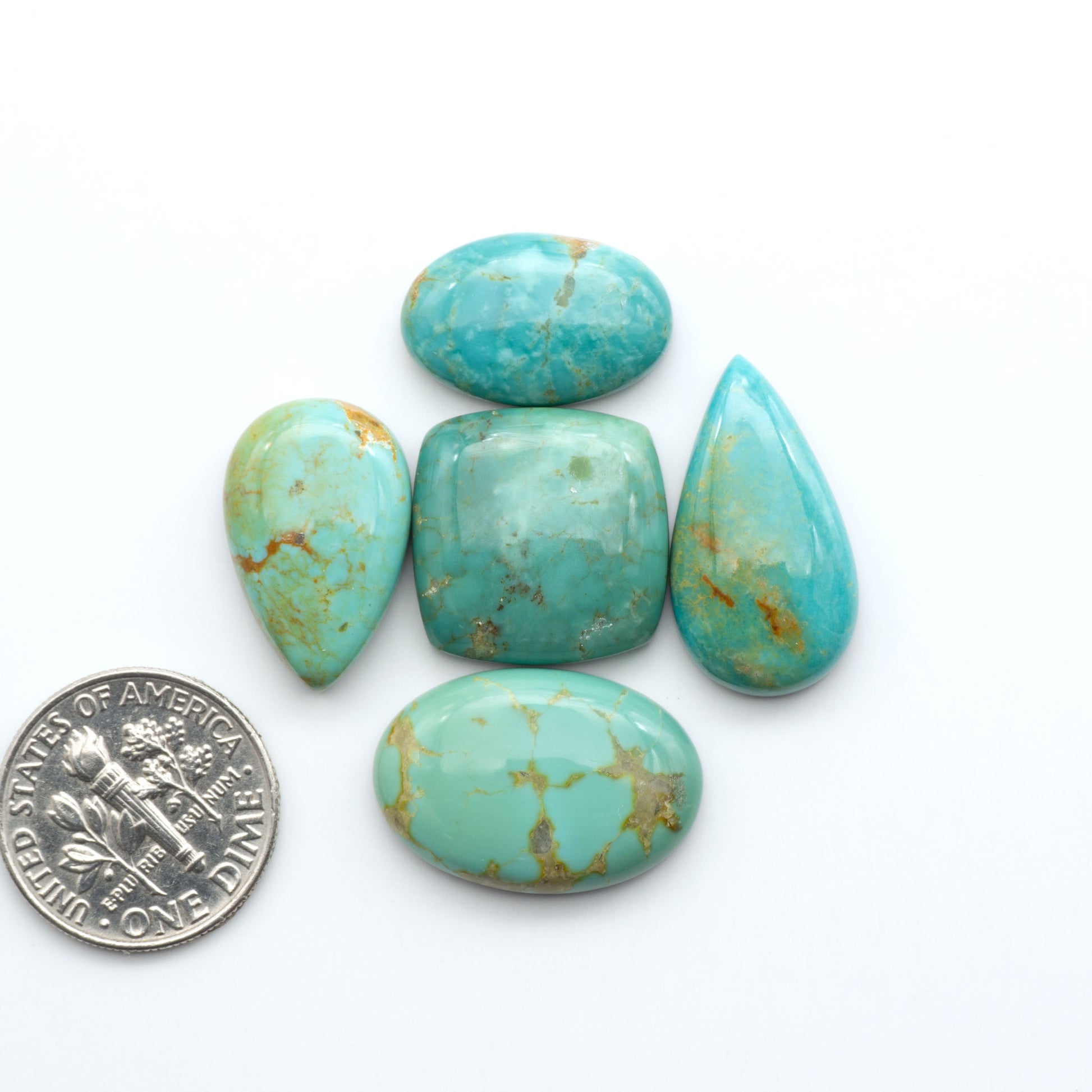 Experience the beauty of Turquoise Mountain Cabochons. With their distinctive blue and green color, these gemstones are perfect for any jewelry piece.