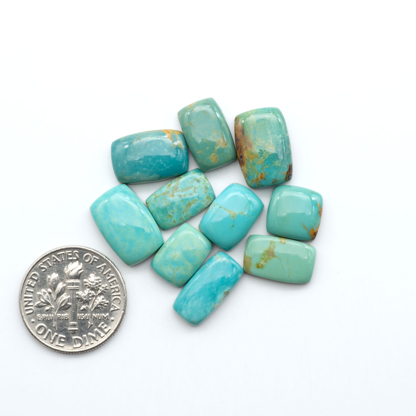 Experience the beauty of Turquoise Mountain Cabochons. With their distinctive blue and green color, these gemstones are perfect for any jewelry piece.