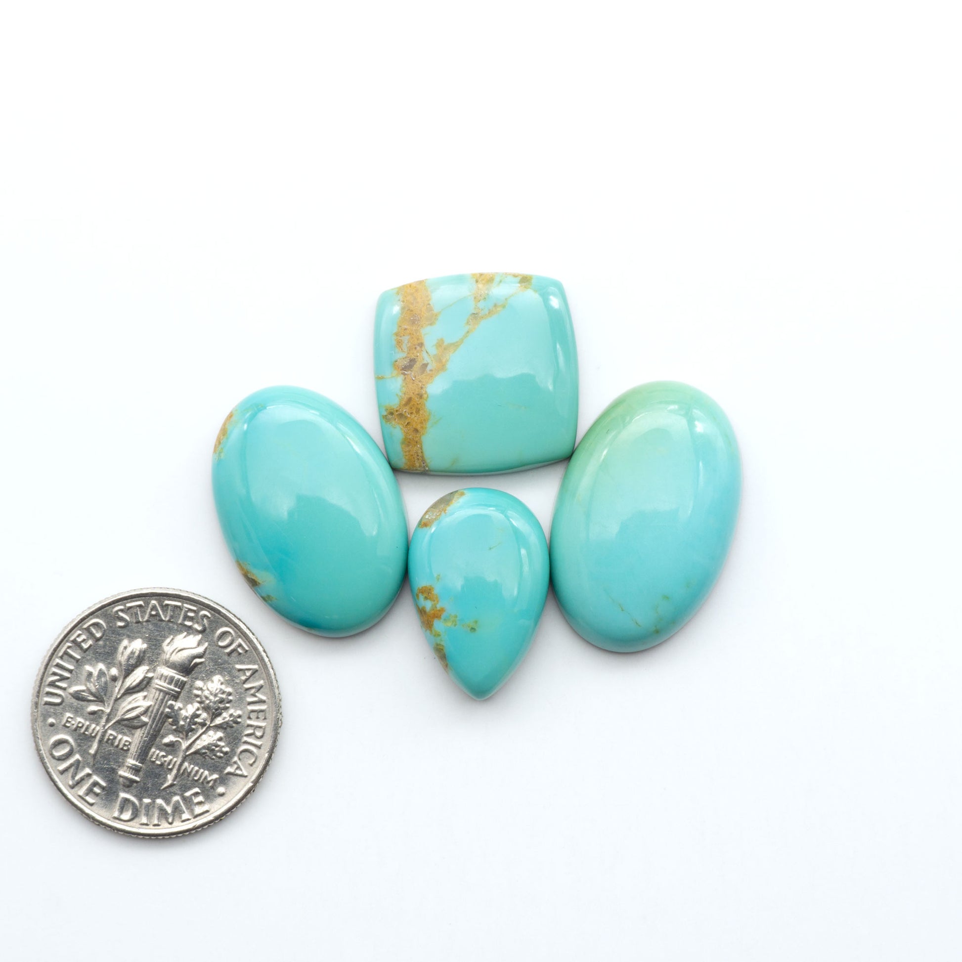 Experience the beauty of Turquoise Mountain Cabochons. With their distinctive blue and green color, these gemstones are perfect for any jewelry piece.