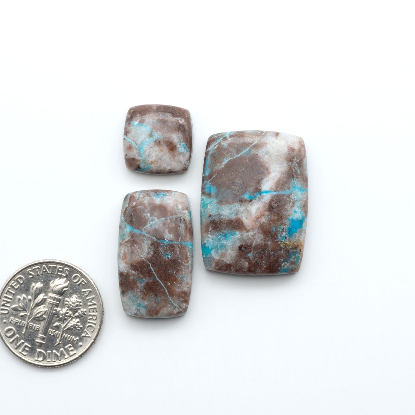 Rare Bisbee Turquoise cabochons with rich blue color and classic brown matrix. Perfect for jewelry makers, collectors, and lovers of fine American turquoise.