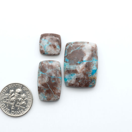 Rare Bisbee Turquoise cabochons with rich blue color and classic brown matrix. Perfect for jewelry makers, collectors, and lovers of fine American turquoise.