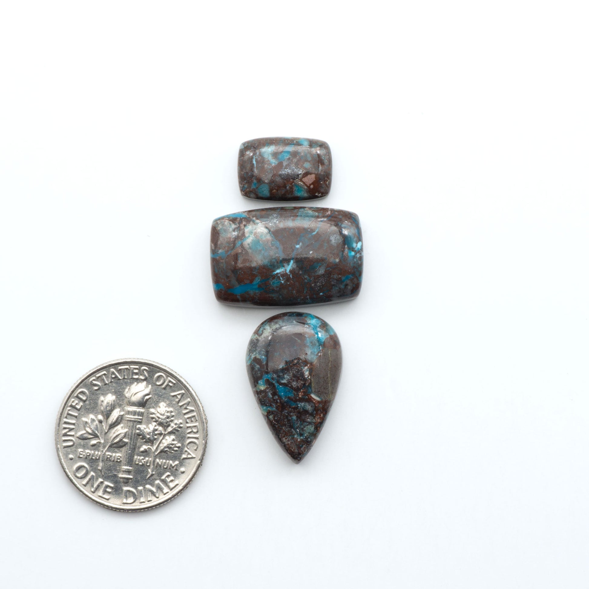 Rare Bisbee Turquoise cabochons with rich blue color and classic brown matrix. Perfect for jewelry makers, collectors, and lovers of fine American turquoise.