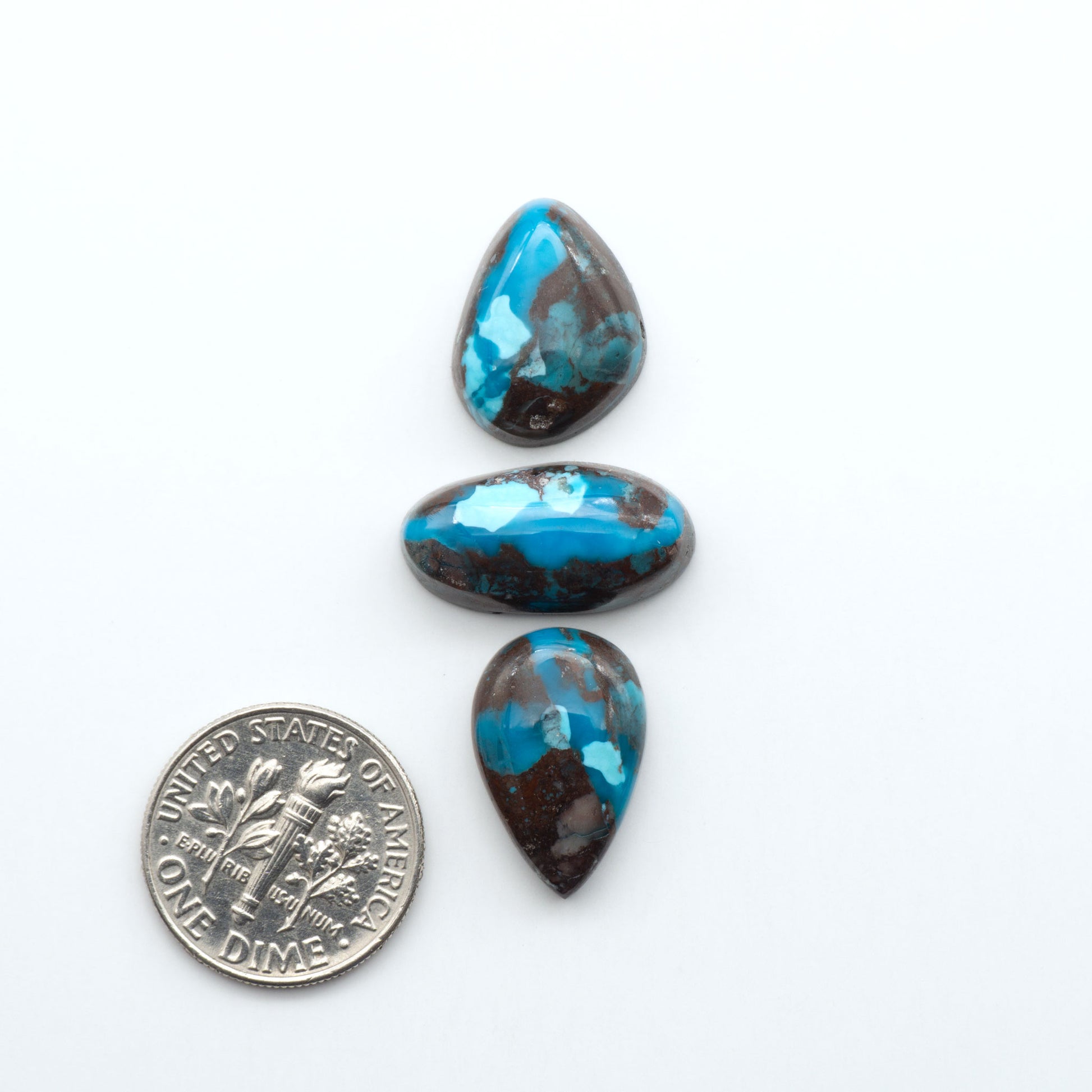 Rare Bisbee Turquoise cabochons with rich blue color and classic brown matrix. Perfect for jewelry makers, collectors, and lovers of fine American turquoise.