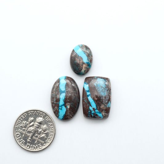 Rare Bisbee Turquoise cabochons with rich blue color and classic brown matrix. Perfect for jewelry makers, collectors, and lovers of fine American turquoise.