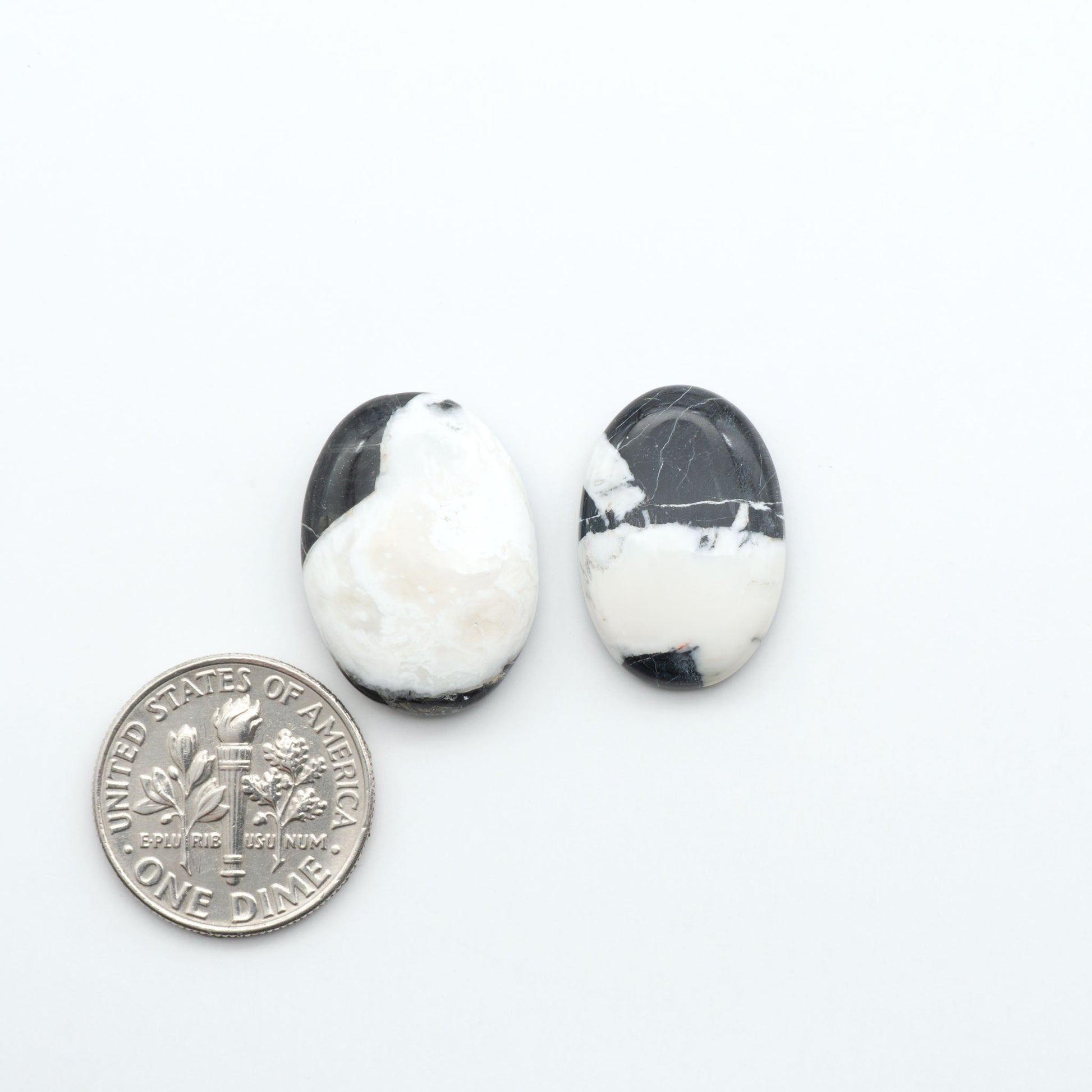 Natural White Buffalo Stone Cabochons are semi-precious gemstones cut into shapes ideal for jewelry-making, making them an excellent choice for artisans.