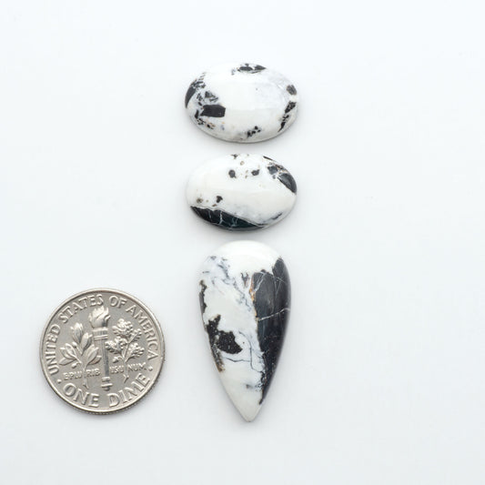 Natural White Buffalo Stone Cabochons are semi-precious gemstones cut into shapes ideal for jewelry-making, making them an excellent choice for artisans.