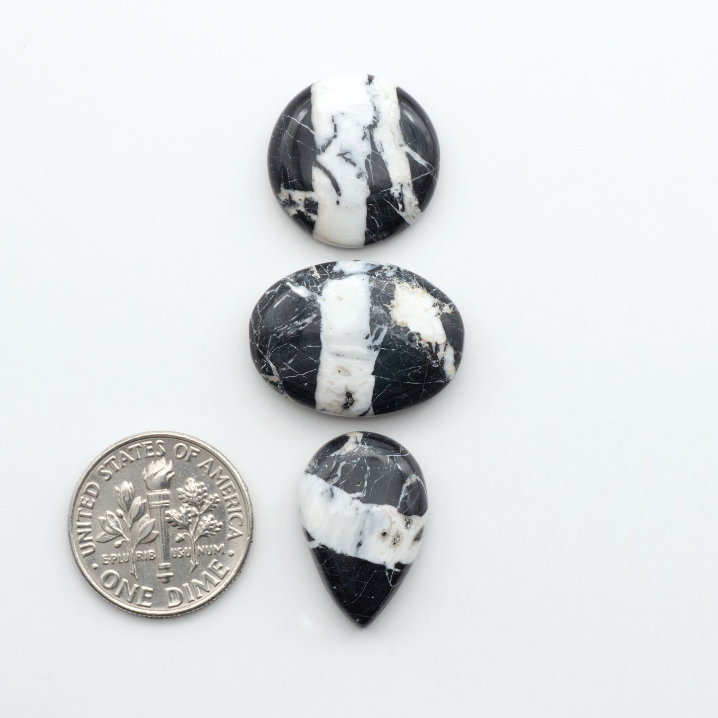 Natural White Buffalo Stone Cabochons are semi-precious gemstones cut into shapes ideal for jewelry-making, making them an excellent choice for artisans.