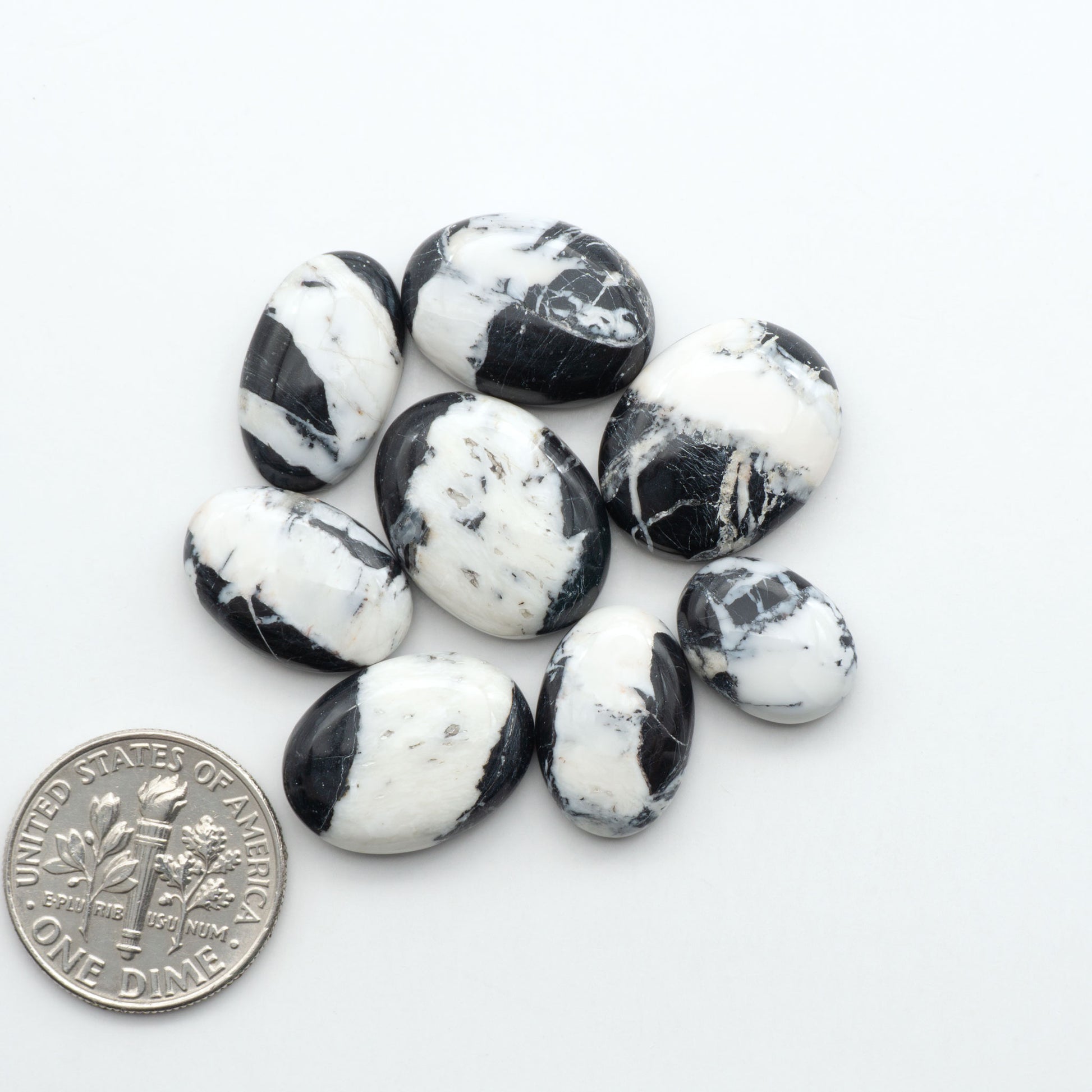 Natural White Buffalo Stone Cabochons are semi-precious gemstones cut into shapes ideal for jewelry-making, making them an excellent choice for artisans.