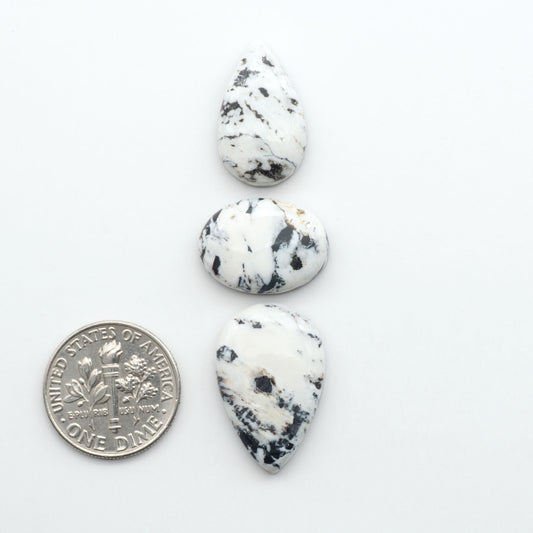 Natural White Buffalo Stone Cabochons are semi-precious gemstones cut into shapes ideal for jewelry-making, making them an excellent choice for artisans.