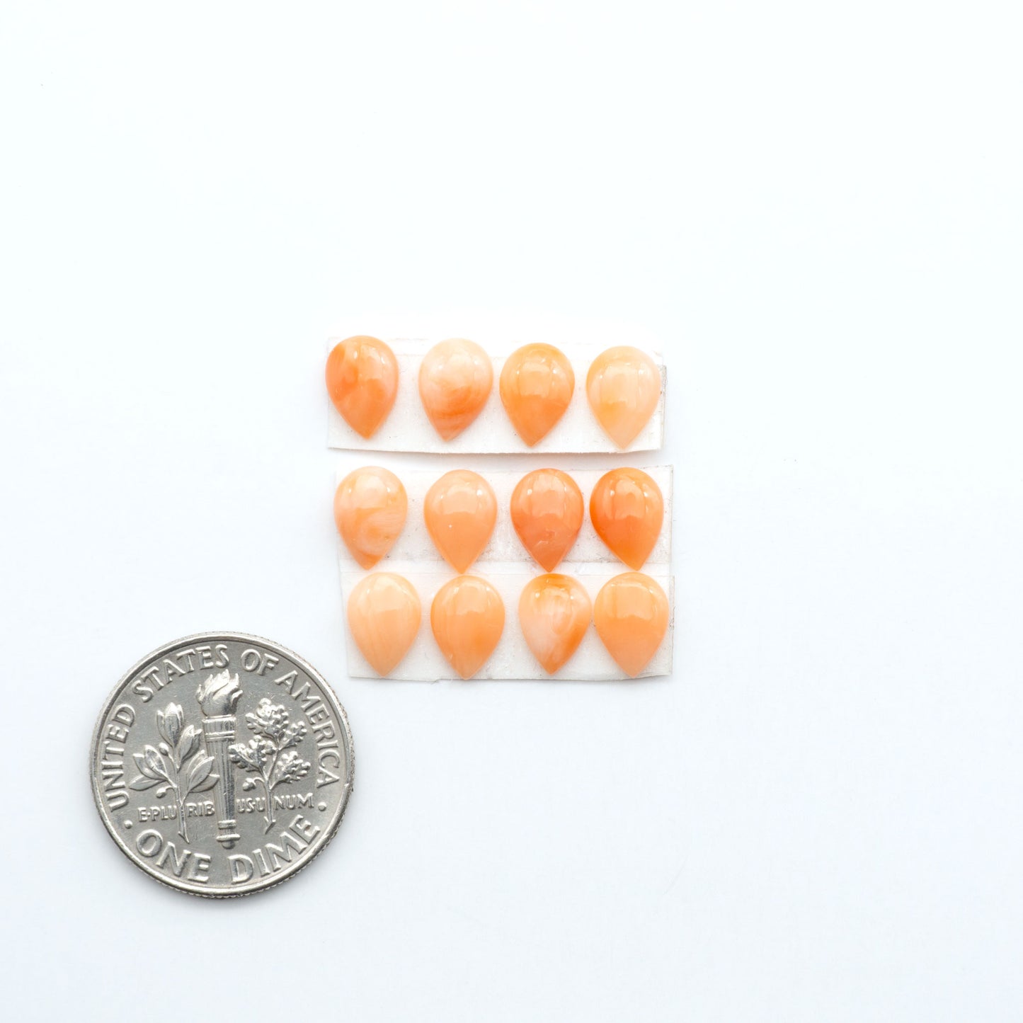 Discover natural pink Coral cabochons with soft salmon hues and smooth polish, ideal for creating timeless handcrafted rings, pendants, and custom designs.