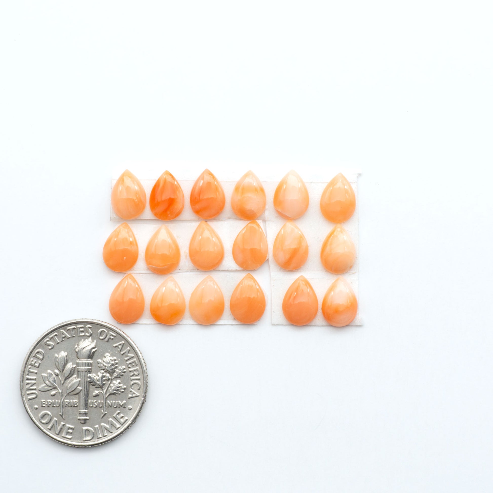 Discover natural pink Coral cabochons with soft salmon hues and smooth polish, ideal for creating timeless handcrafted rings, pendants, and custom designs.
