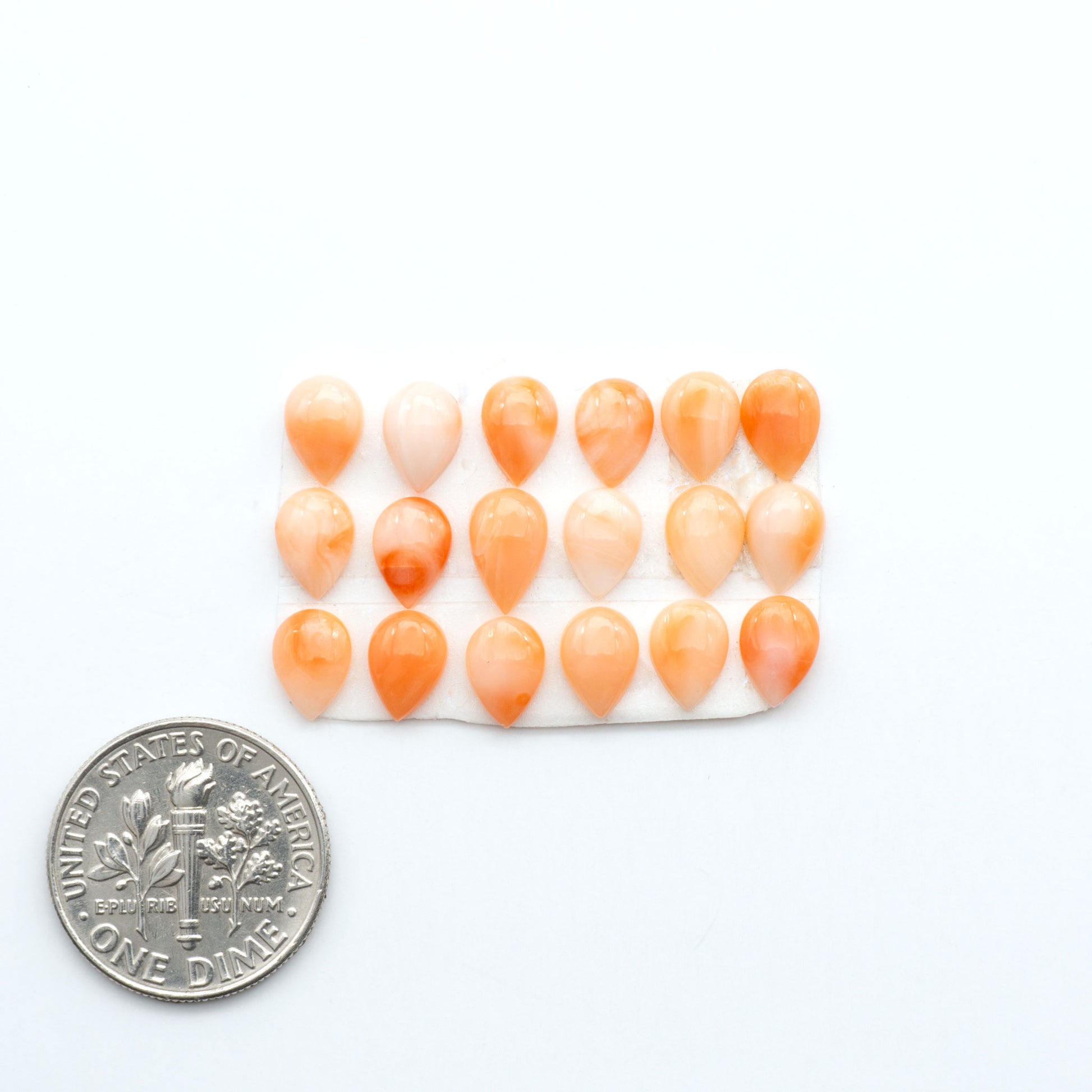 Discover natural pink Coral cabochons with soft salmon hues and smooth polish, ideal for creating timeless handcrafted rings, pendants, and custom designs.