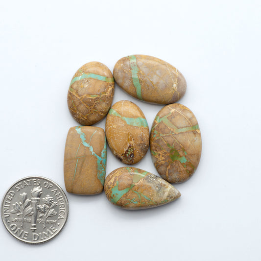These Crow Springs Ribbon Turquoise Cabochons have a rich color and matrix that are sure to add a unique touch to a variety of jewelry pieces.