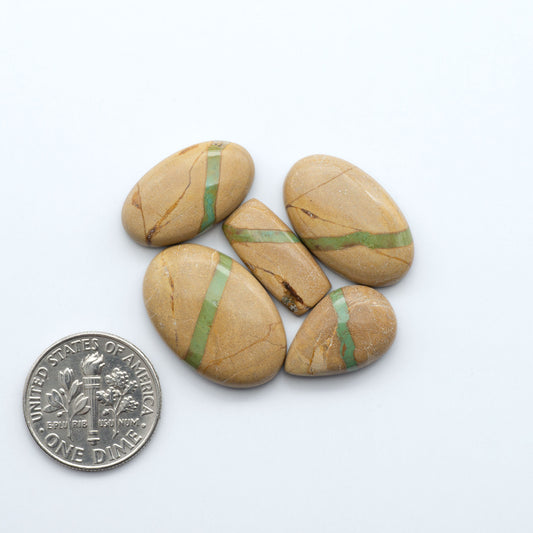 These Crow Springs Ribbon Turquoise Cabochons have a rich color and matrix that are sure to add a unique touch to a variety of jewelry pieces.