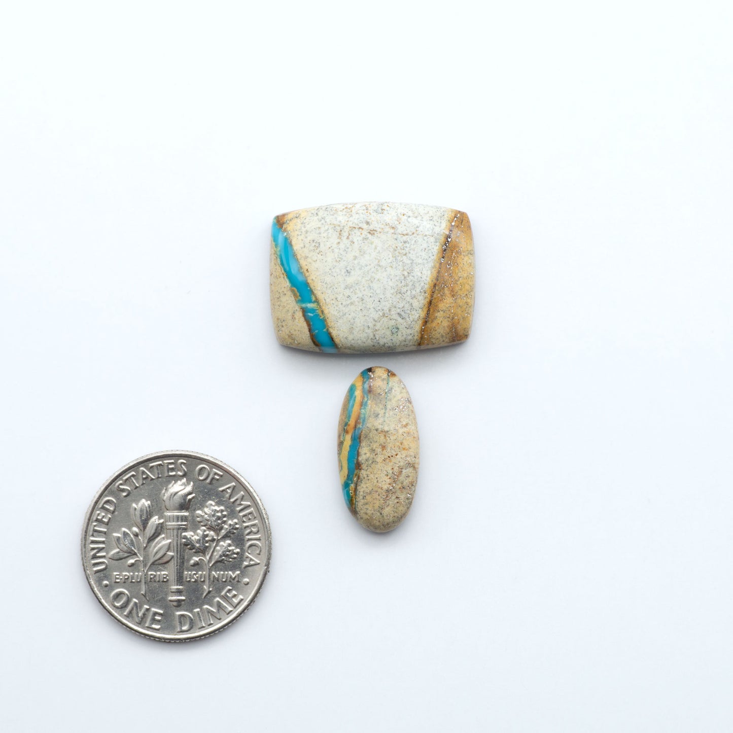 Royston Turquoise cabochons are famous for their distinctive matrix and unique green and blue hues, making them a favored option among jewelry designers.