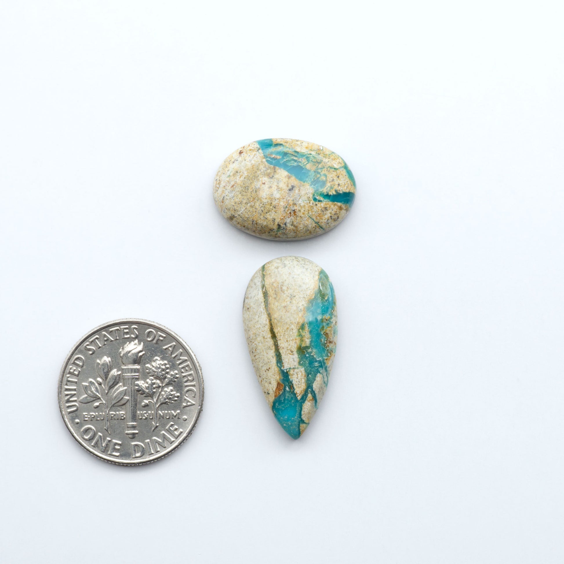 Royston Turquoise cabochons are famous for their distinctive matrix and unique green and blue hues, making them a favored option among jewelry designers.