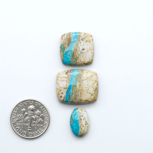 Royston Turquoise cabochons are famous for their distinctive matrix and unique green and blue hues, making them a favored option among jewelry designers.