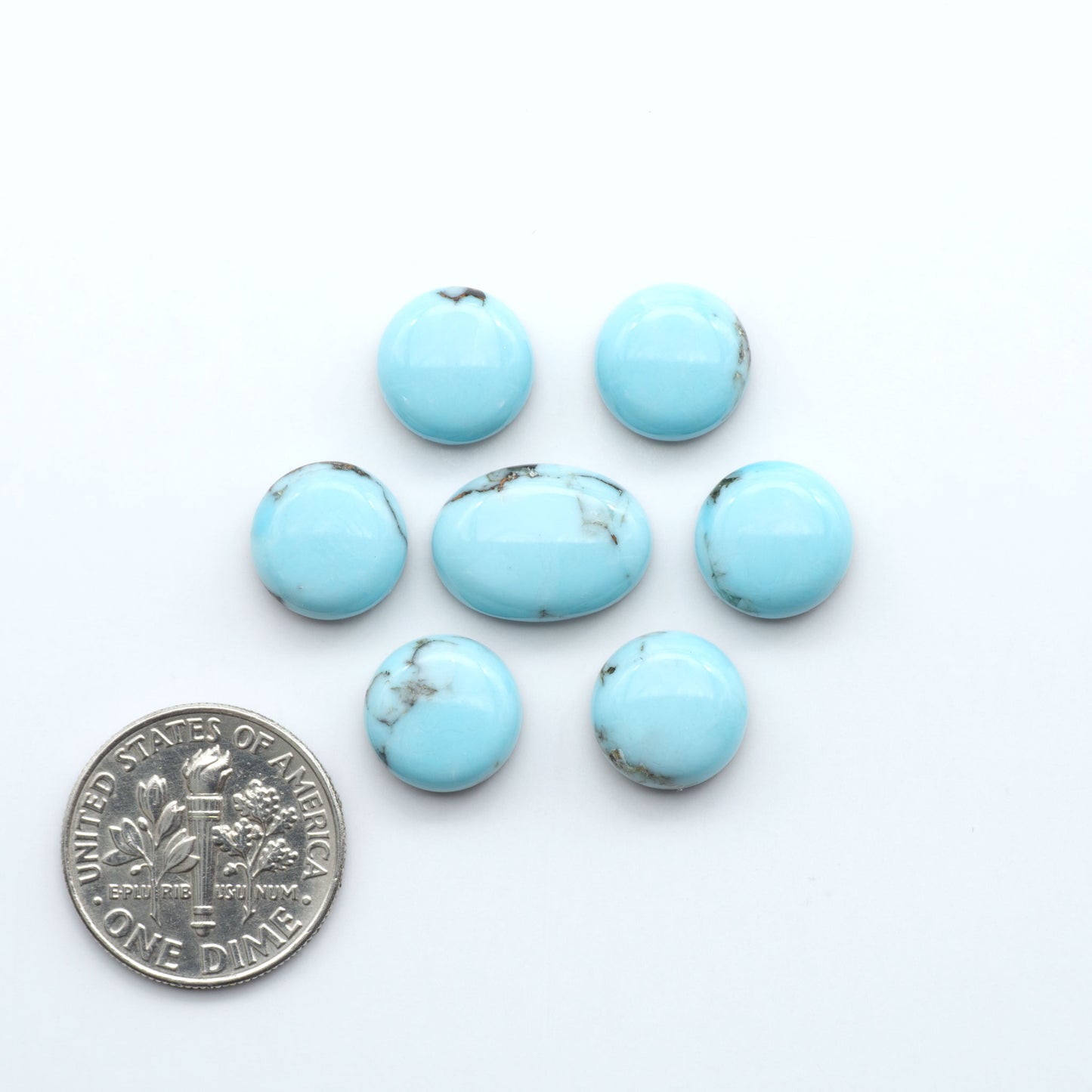 Enhance your jewelry designs with Pressed Turquoise Nugget Cabochons. Crafted from composite materials they add a captivating touch to your creations.