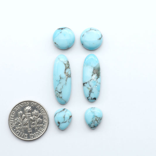 Enhance your jewelry designs with Pressed Turquoise Nugget Cabochons. Crafted from composite materials they add a captivating touch to your creations.