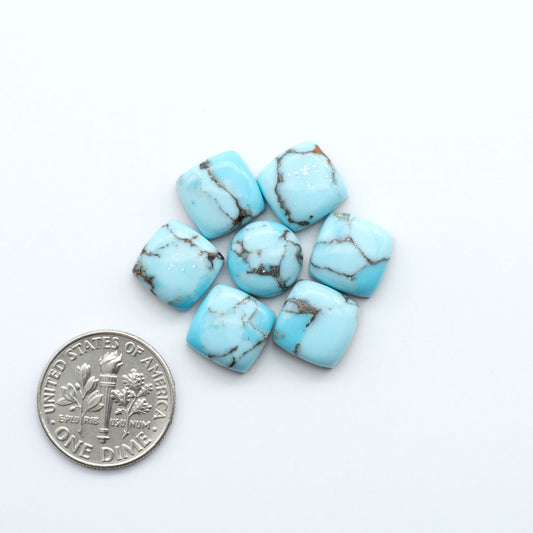 Enhance your jewelry designs with Pressed Turquoise Nugget Cabochons. Crafted from composite materials they add a captivating touch to your creations.