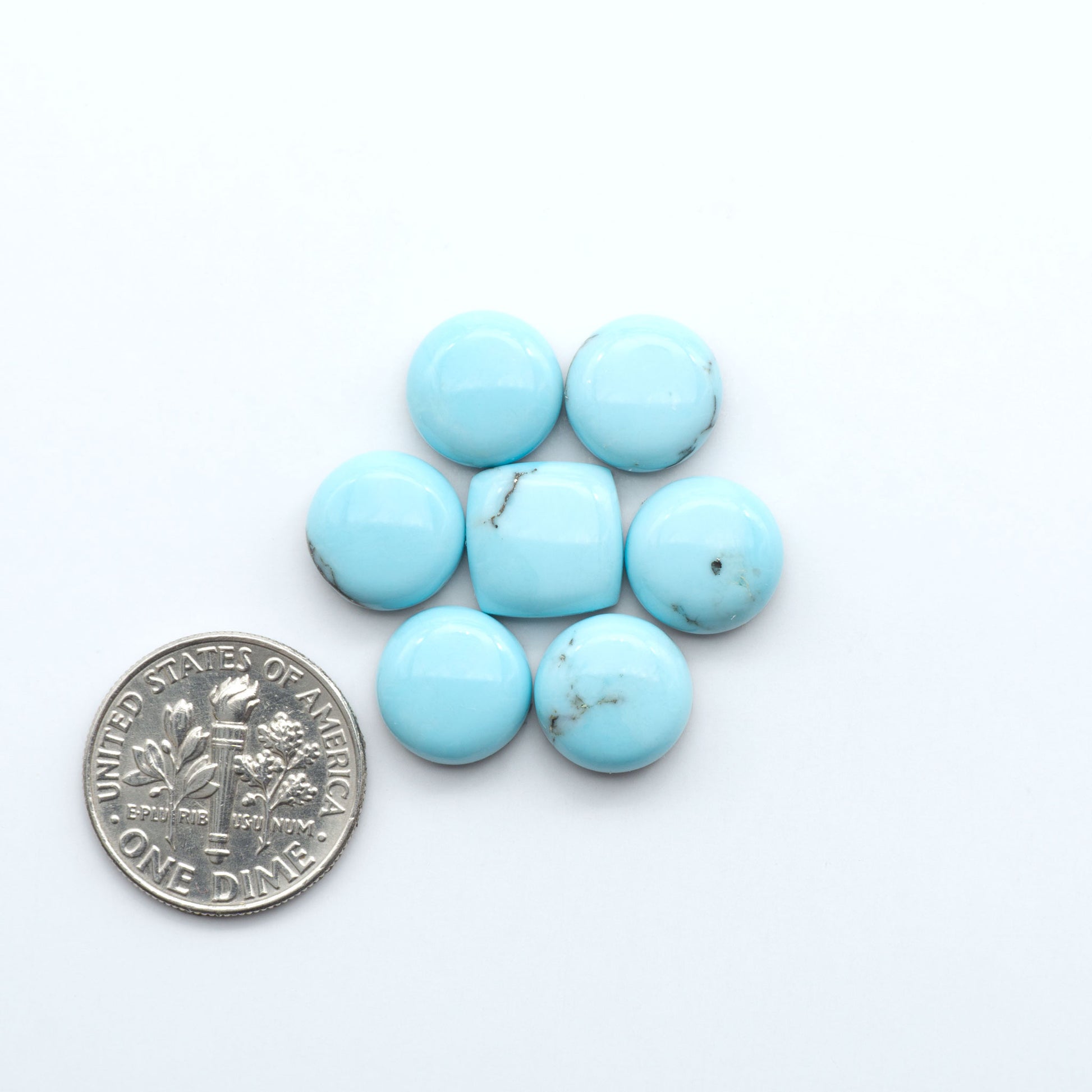 Enhance your jewelry designs with Pressed Turquoise Nugget Cabochons. Crafted from composite materials they add a captivating touch to your creations.