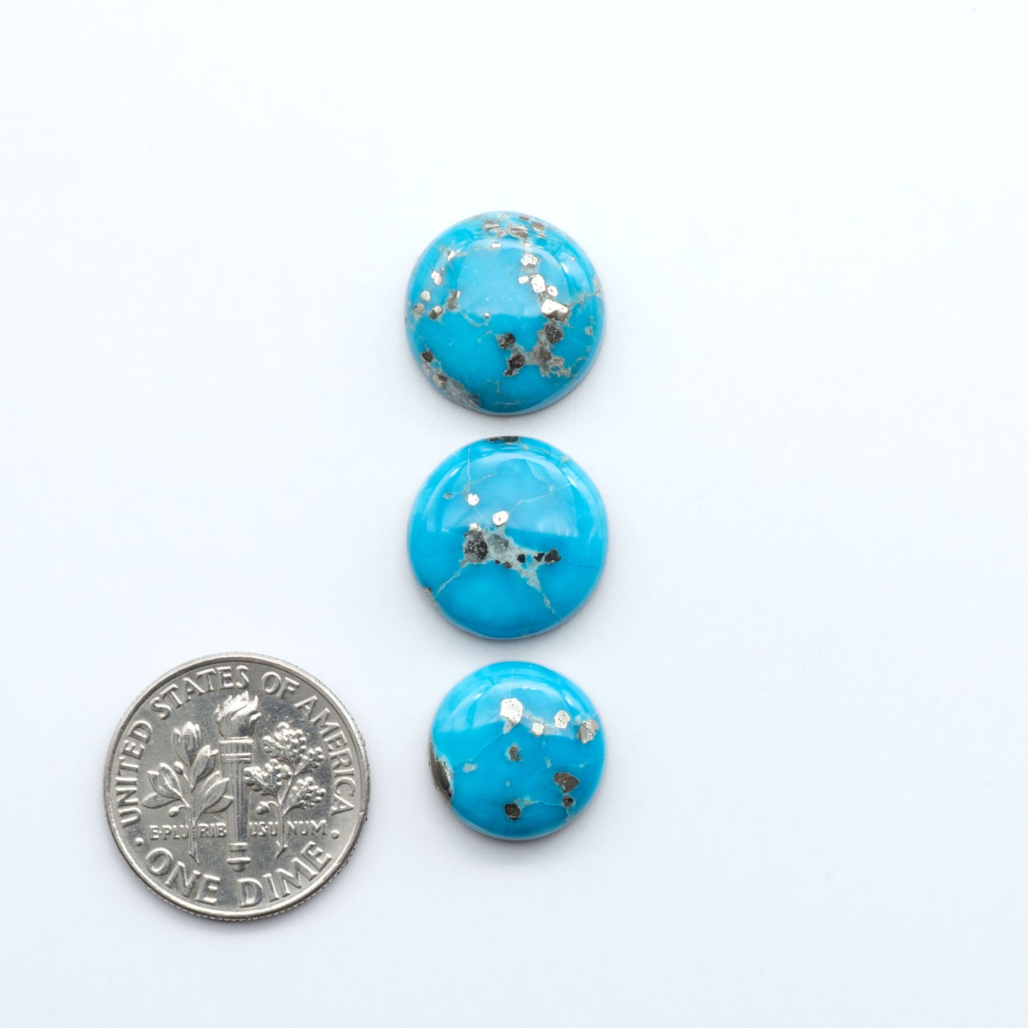 Sierra Bella Turquoise cabochons feature rich blue-green color and natural matrix variation. Ideal for silversmiths, jewelers, and custom jewelry designs.