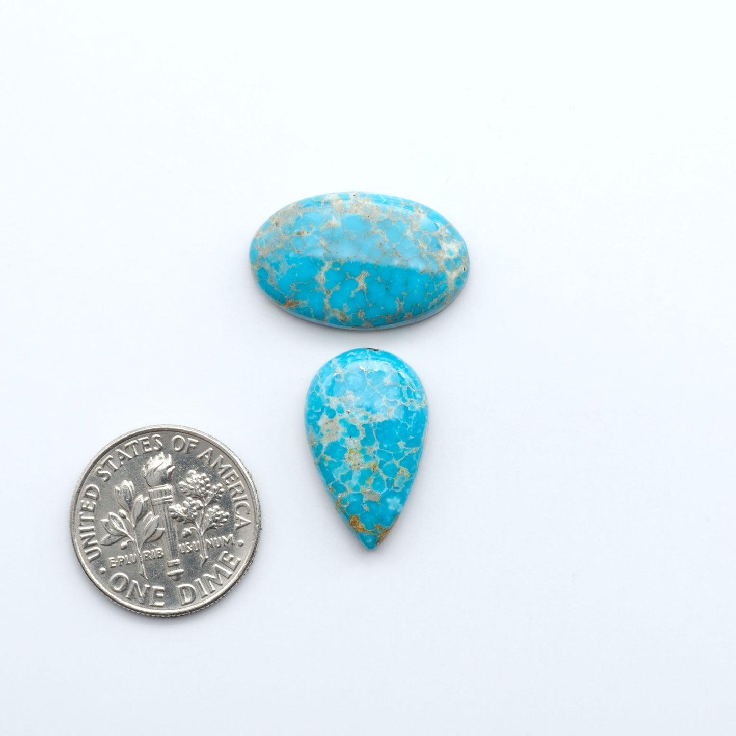 Sierra Bella Turquoise cabochons feature rich blue-green color and natural matrix variation. Ideal for silversmiths, jewelers, and custom jewelry designs.
