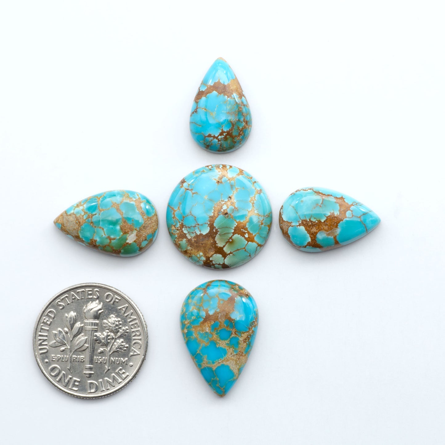 Sierra Bella Turquoise cabochons feature rich blue-green color and natural matrix variation. Ideal for silversmiths, jewelers, and custom jewelry designs.