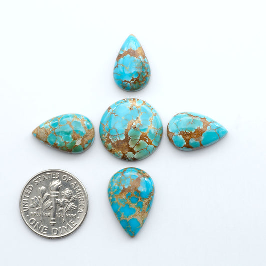 Sierra Bella Turquoise cabochons feature rich blue-green color and natural matrix variation. Ideal for silversmiths, jewelers, and custom jewelry designs.