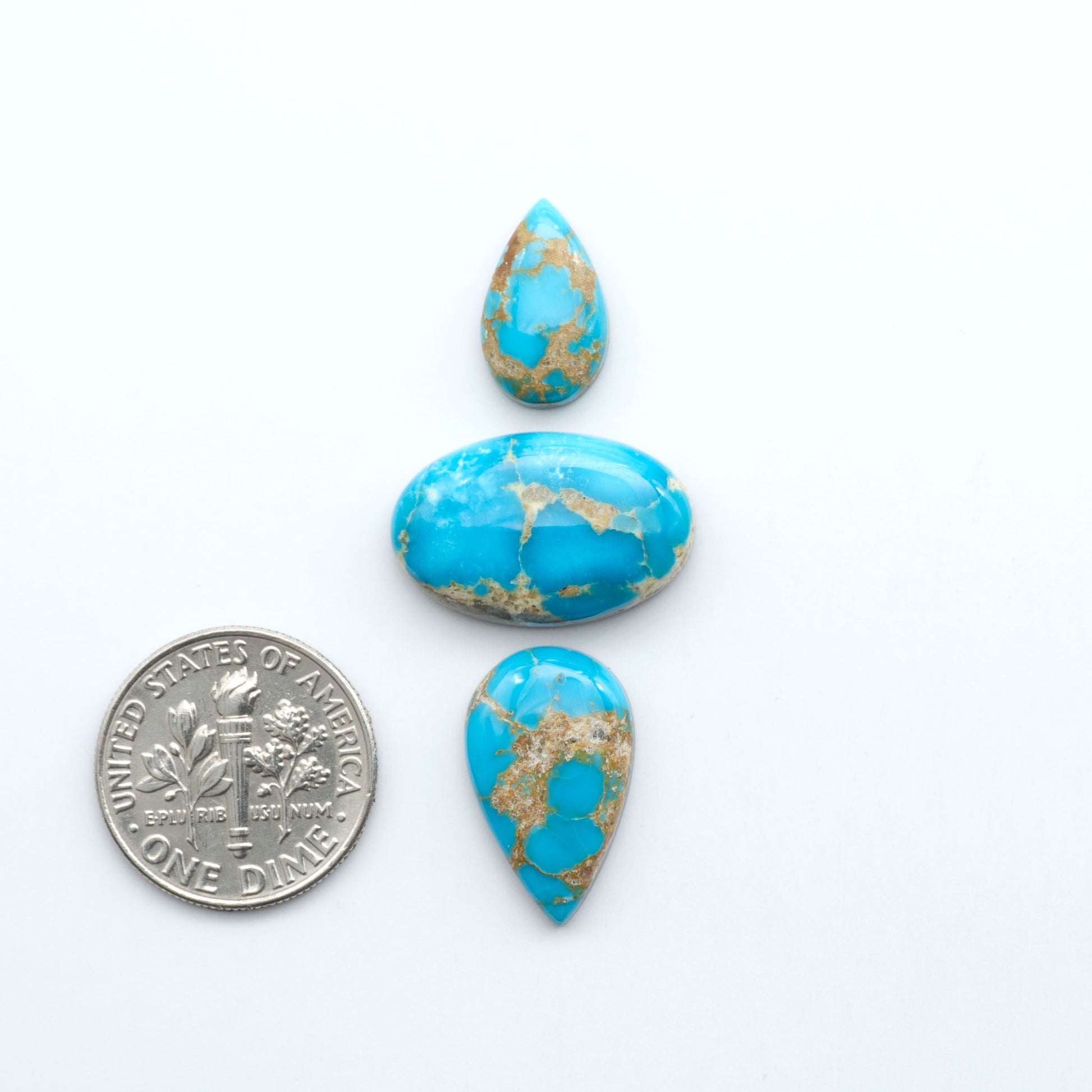 Sierra Bella Turquoise cabochons feature rich blue-green color and natural matrix variation. Ideal for silversmiths, jewelers, and custom jewelry designs.