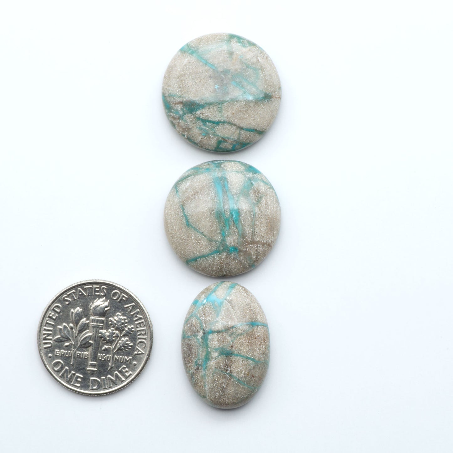 Carico Lake Turquoise cabochons with vibrant aqua-blue to turquoise tones and natural matrix, ideal for rings, pendants, and artisan jewelry.