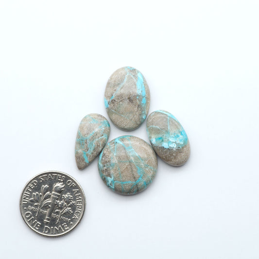 Carico Lake Turquoise cabochons with vibrant aqua-blue to turquoise tones and natural matrix, ideal for rings, pendants, and artisan jewelry.