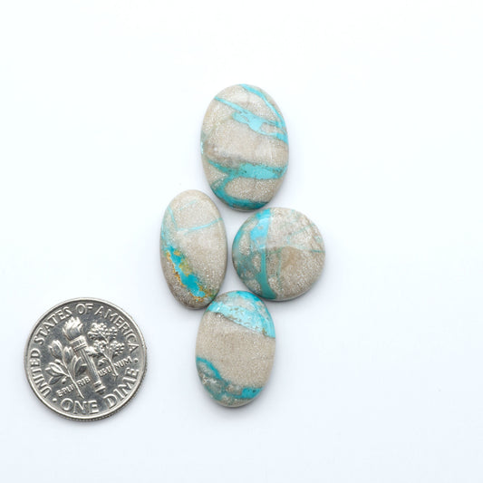 Carico Lake Turquoise cabochons with vibrant aqua-blue to turquoise tones and natural matrix, ideal for rings, pendants, and artisan jewelry.