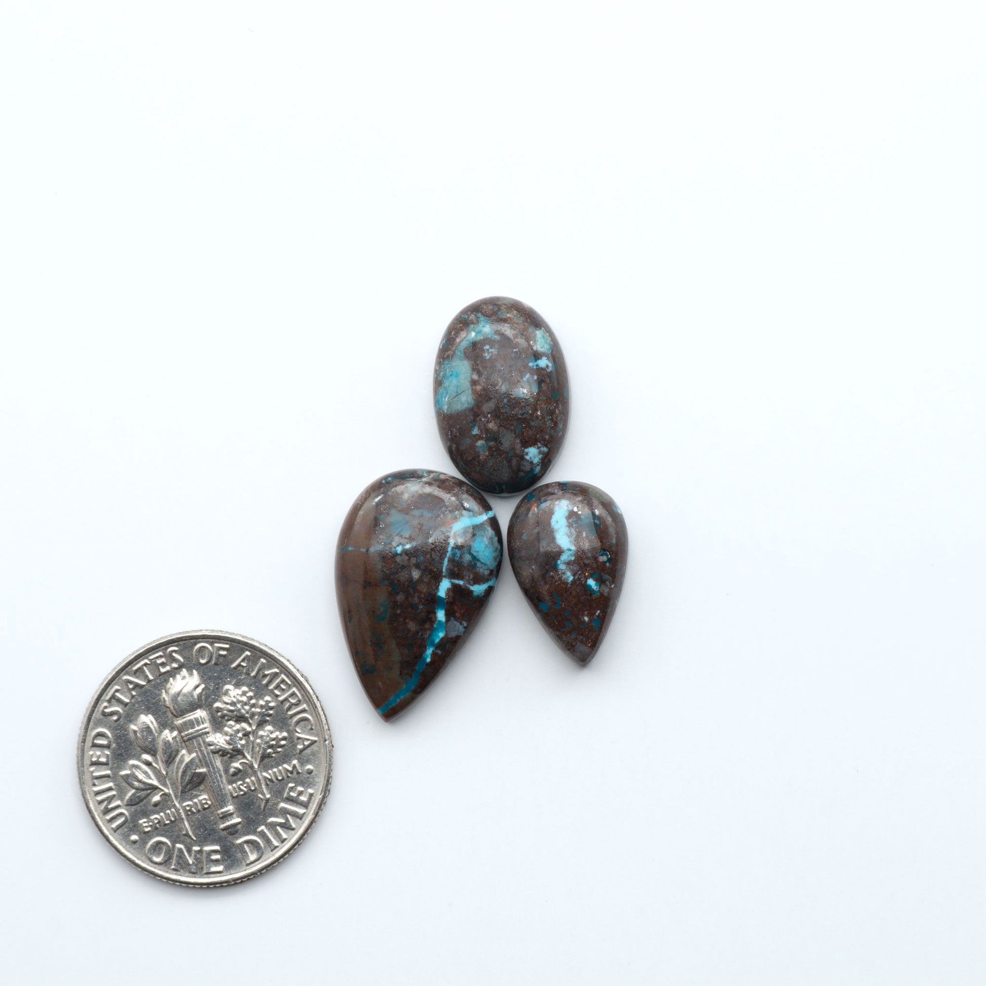 Rare Bisbee Turquoise cabochons with rich blue color and classic brown matrix. Perfect for jewelry makers, collectors, and lovers of fine American turquoise.
