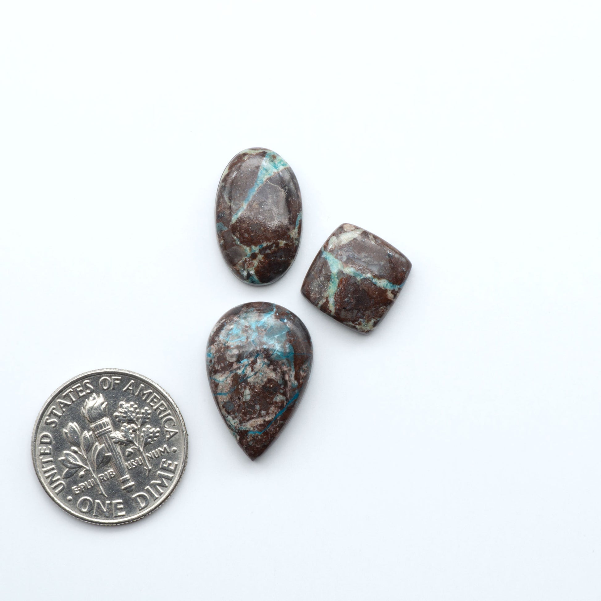 Rare Bisbee Turquoise cabochons with rich blue color and classic brown matrix. Perfect for jewelry makers, collectors, and lovers of fine American turquoise.