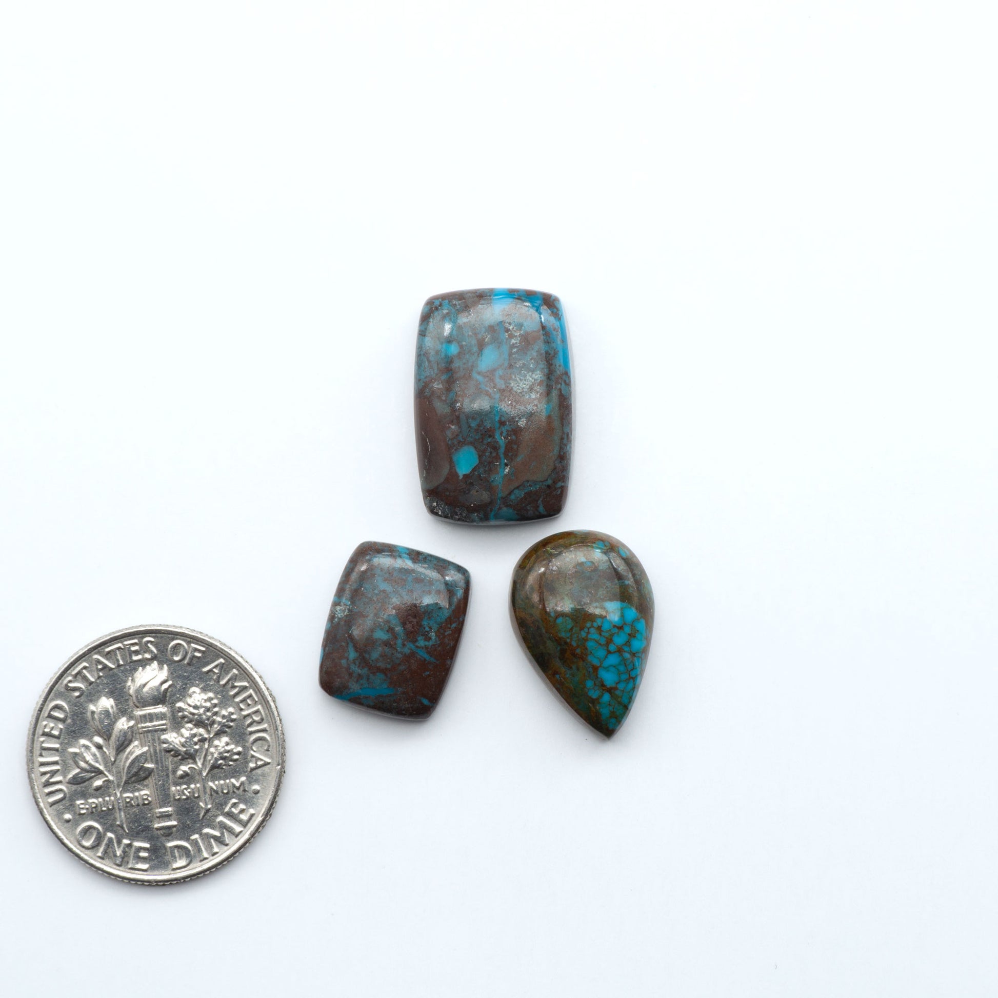 Rare Bisbee Turquoise cabochons with rich blue color and classic brown matrix. Perfect for jewelry makers, collectors, and lovers of fine American turquoise.
