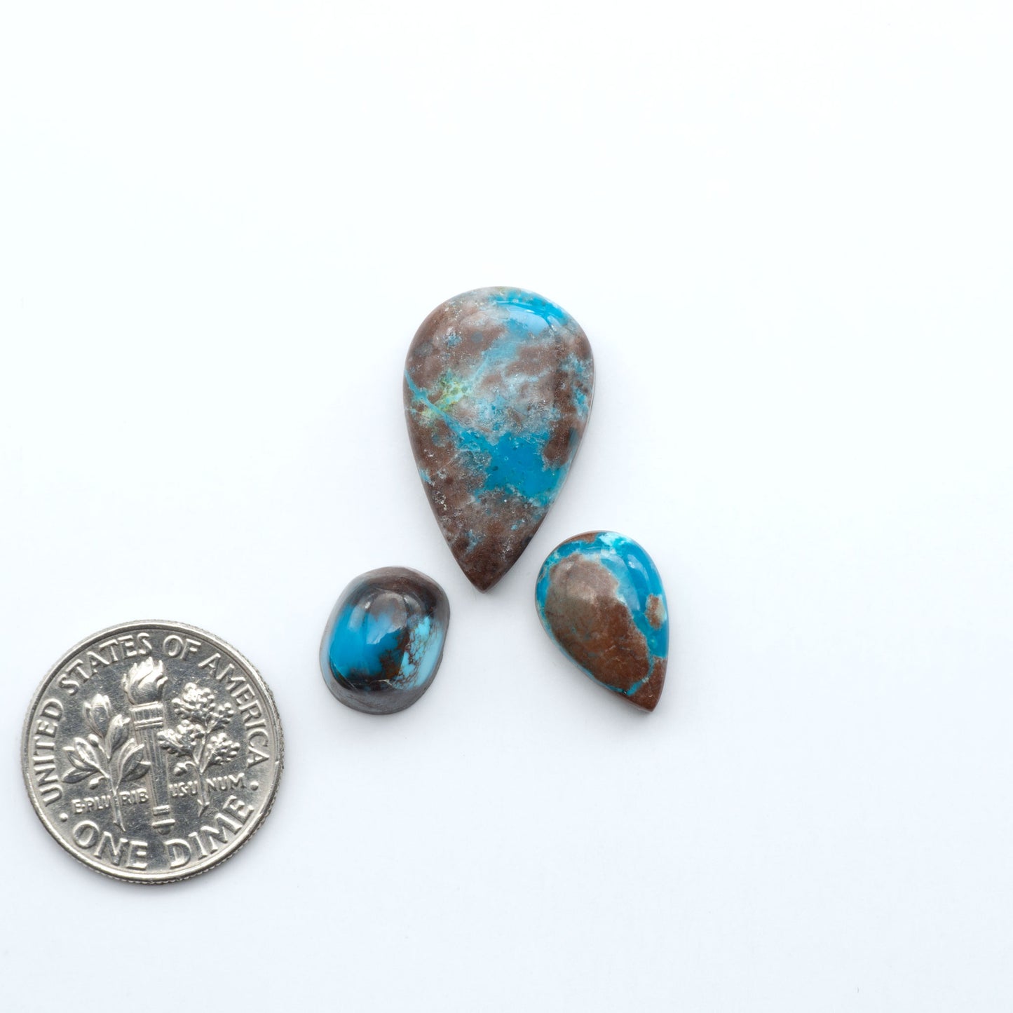 Rare Bisbee Turquoise cabochons with rich blue color and classic brown matrix. Perfect for jewelry makers, collectors, and lovers of fine American turquoise.