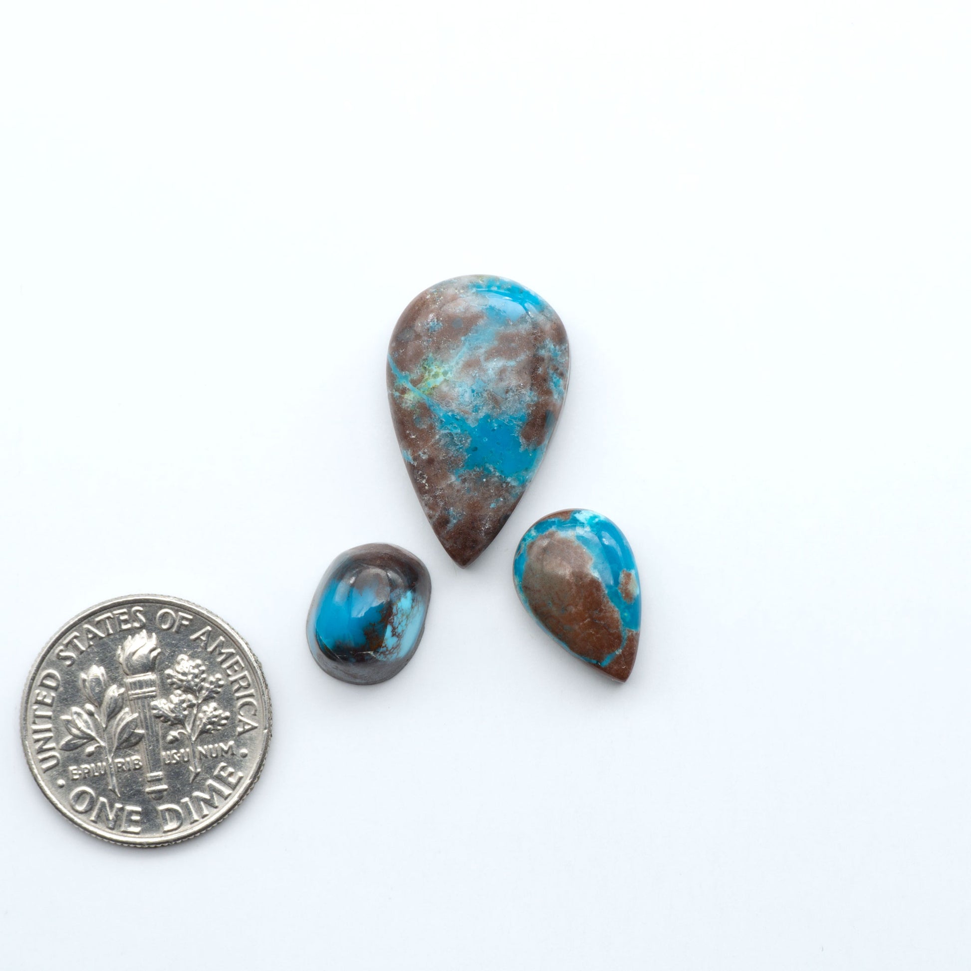 Rare Bisbee Turquoise cabochons with rich blue color and classic brown matrix. Perfect for jewelry makers, collectors, and lovers of fine American turquoise.