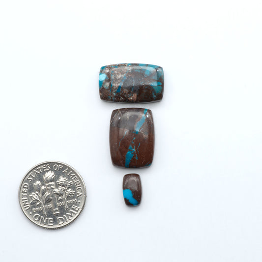 Rare Bisbee Turquoise cabochons with rich blue color and classic brown matrix. Perfect for jewelry makers, collectors, and lovers of fine American turquoise.