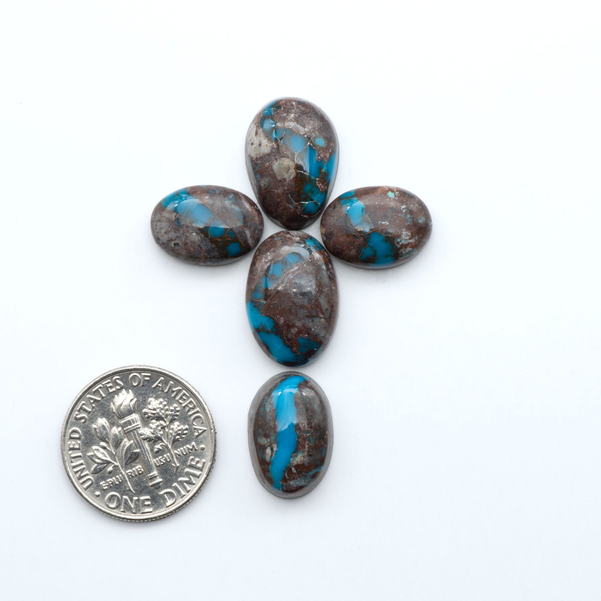 Rare Bisbee Turquoise cabochons with rich blue color and classic brown matrix. Perfect for jewelry makers, collectors, and lovers of fine American turquoise.