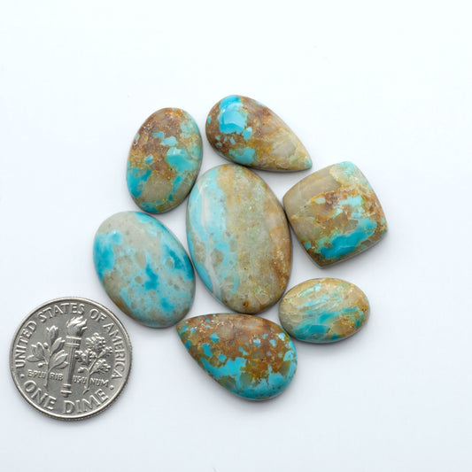 Add a touch of beauty to your collection with our stunning Pilot Mountain Turquoise Cabochons. Perfect for jewelry making each piece is truly one-of-a-kind.