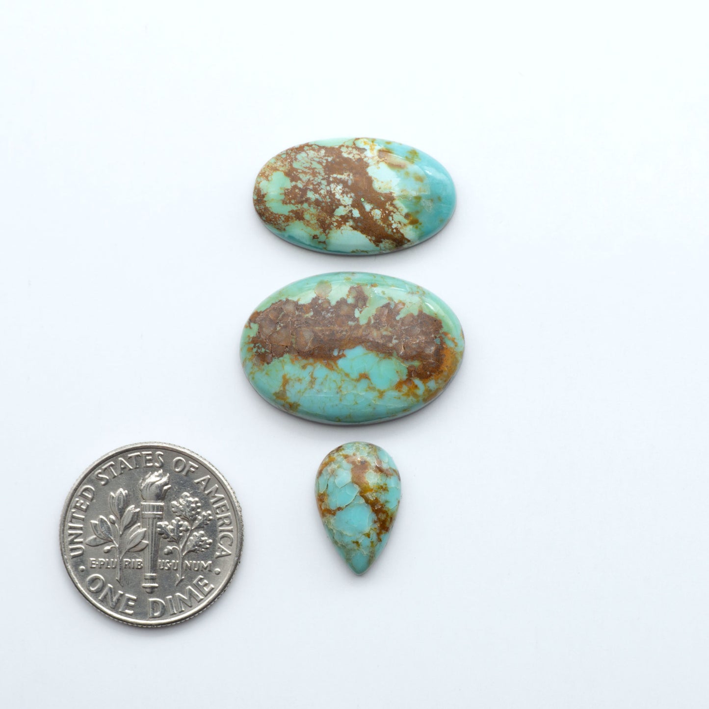 Add a touch of beauty to your collection with our stunning Pilot Mountain Turquoise Cabochons. Perfect for jewelry making each piece is truly one-of-a-kind.