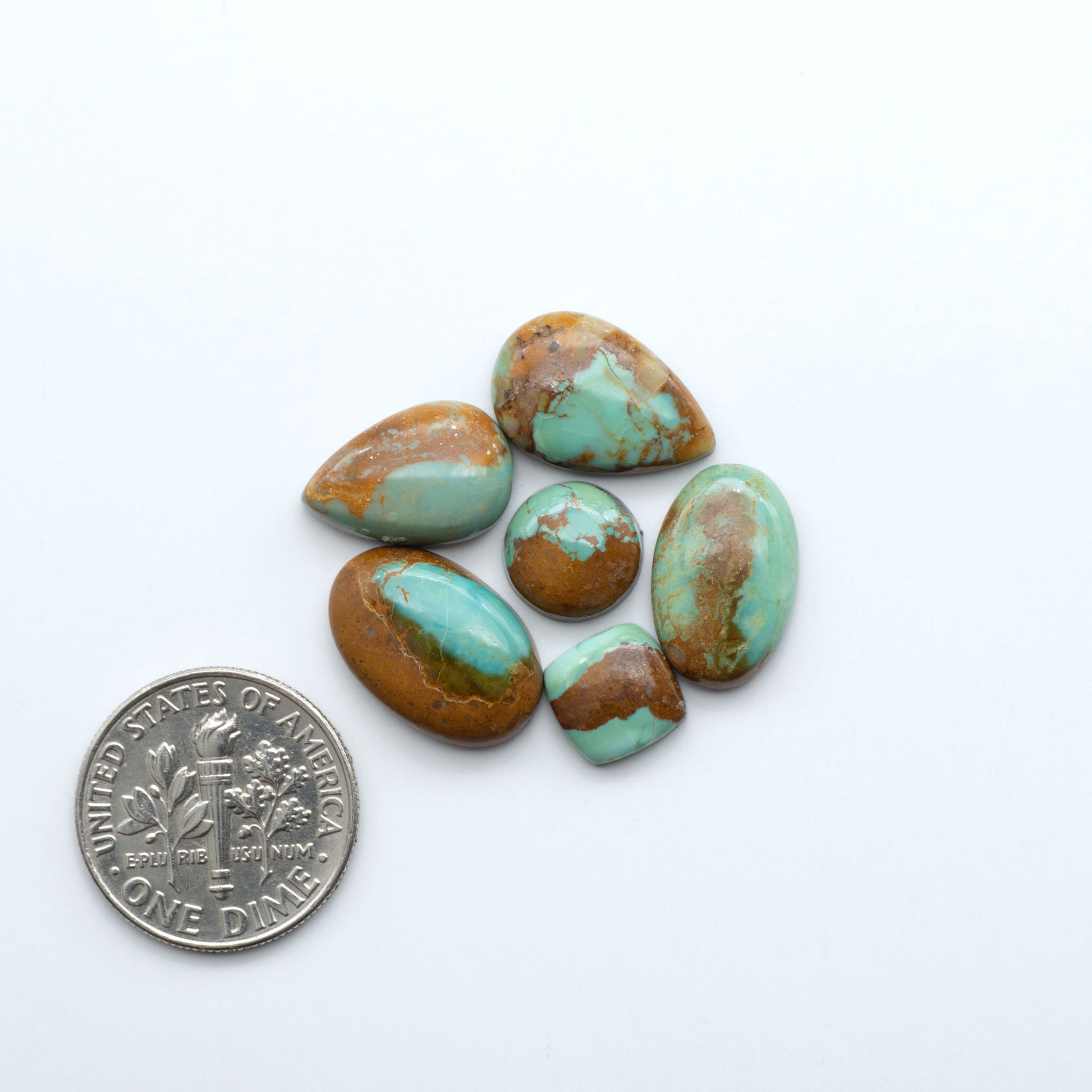 Add a touch of beauty to your collection with our stunning Pilot Mountain Turquoise Cabochons. Perfect for jewelry making each piece is truly one-of-a-kind.