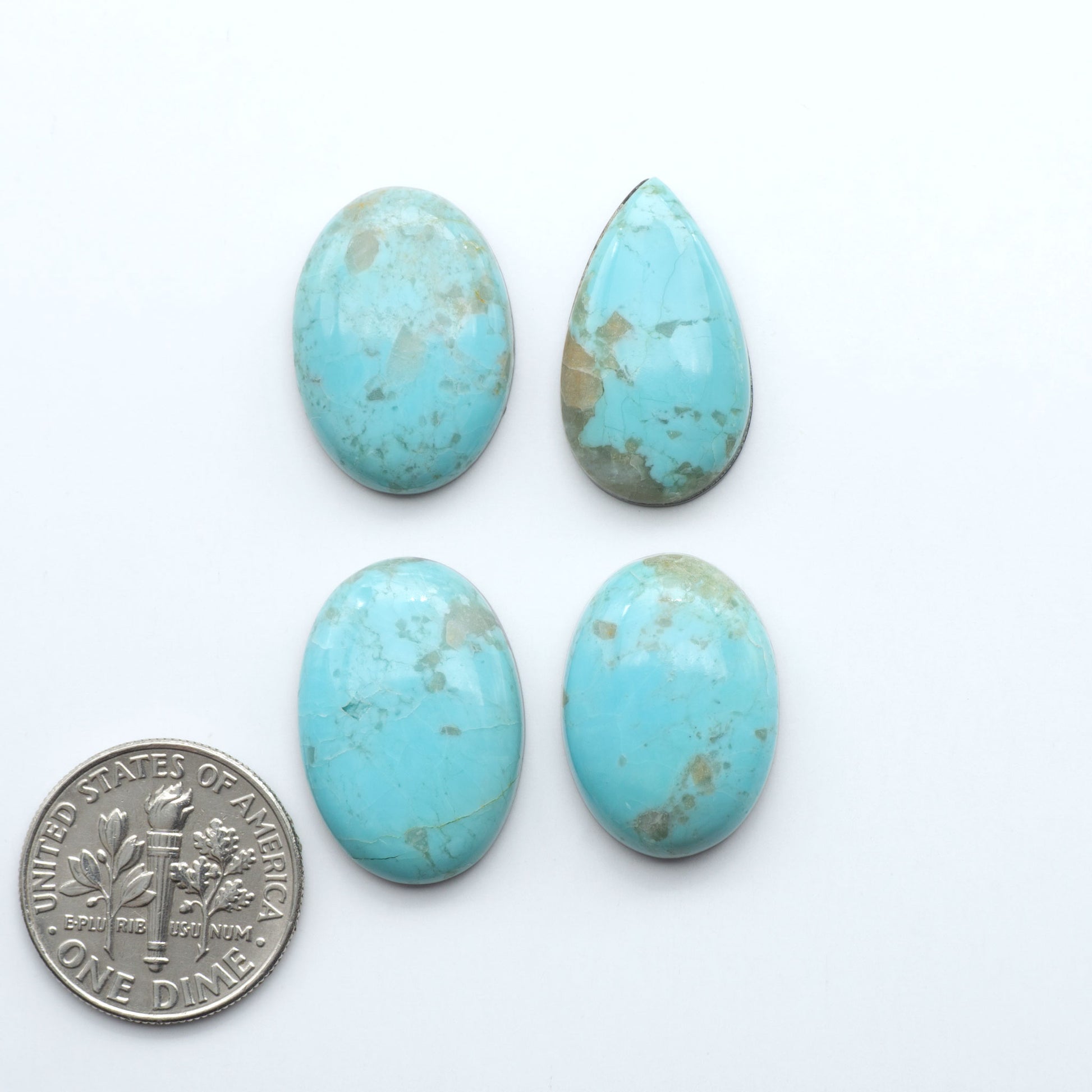 Add a touch of beauty to your collection with our stunning Pilot Mountain Turquoise Cabochons. Perfect for jewelry making each piece is truly one-of-a-kind.