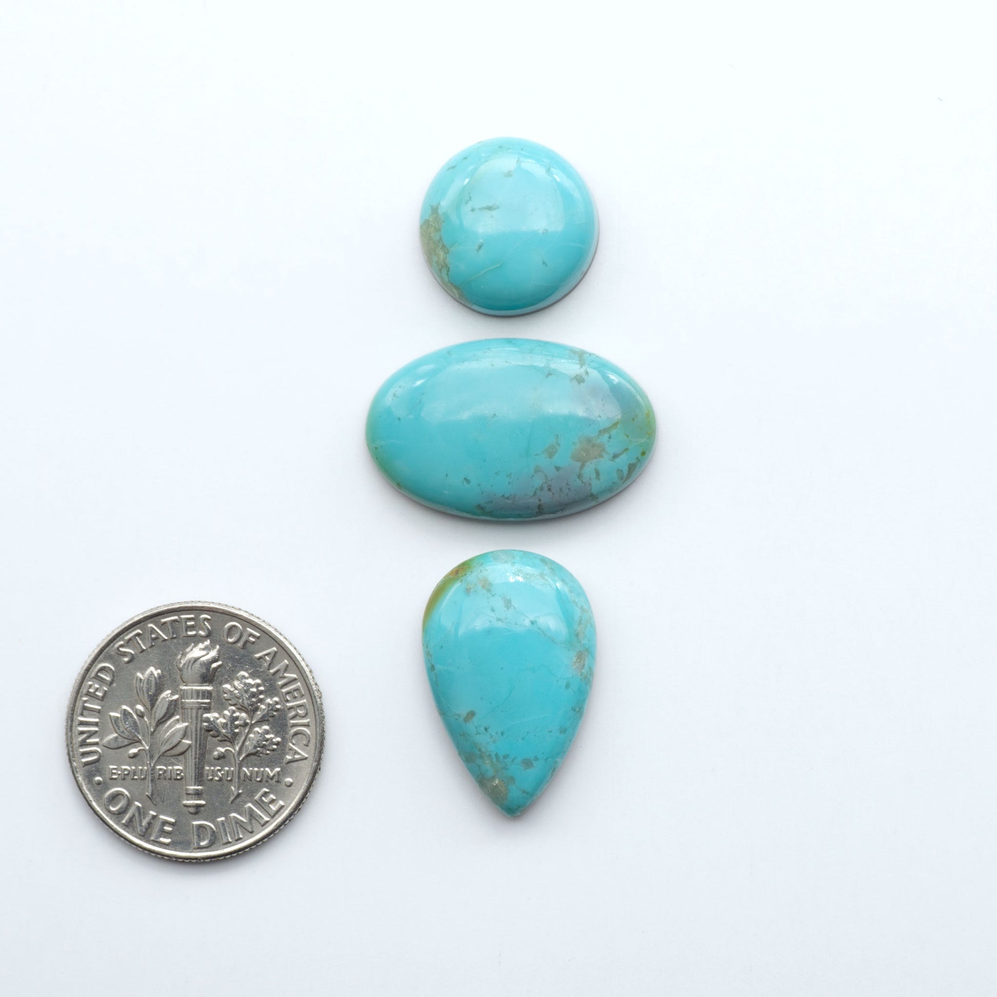 Add a touch of beauty to your collection with our stunning Pilot Mountain Turquoise Cabochons. Perfect for jewelry making each piece is truly one-of-a-kind.