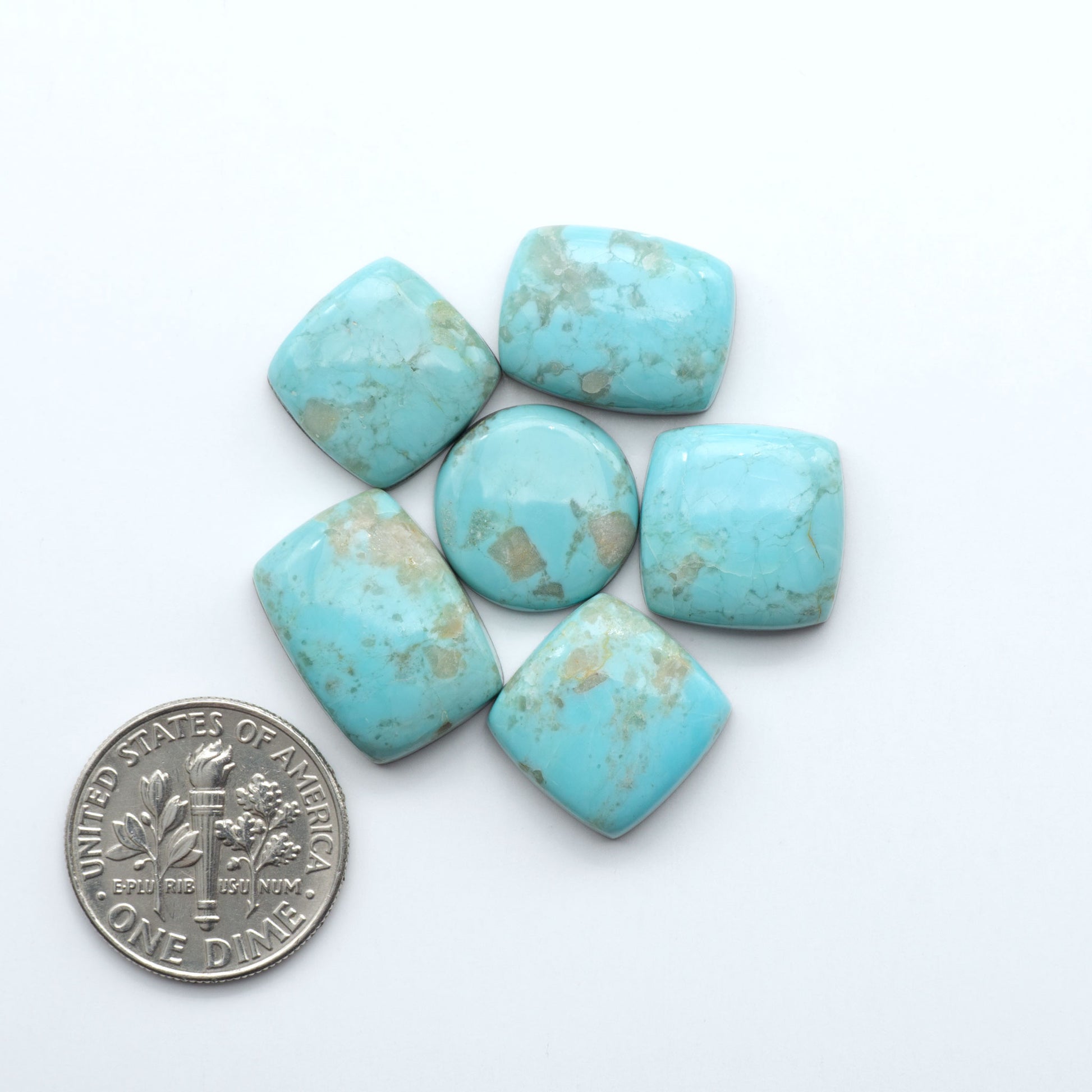 Add a touch of beauty to your collection with our stunning Pilot Mountain Turquoise Cabochons. Perfect for jewelry making each piece is truly one-of-a-kind.