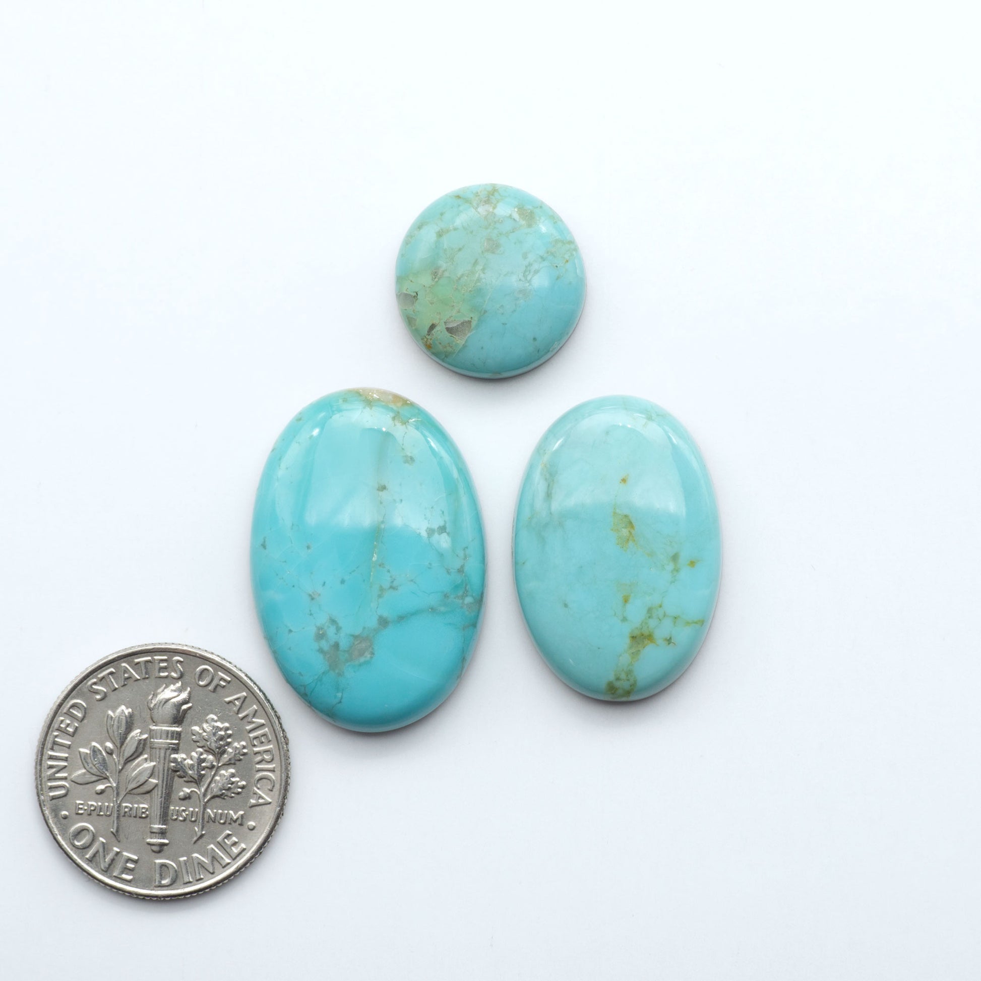 Add a touch of beauty to your collection with our stunning Pilot Mountain Turquoise Cabochons. Perfect for jewelry making each piece is truly one-of-a-kind.
